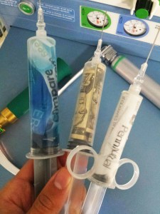 holdinginvestmentsyringes